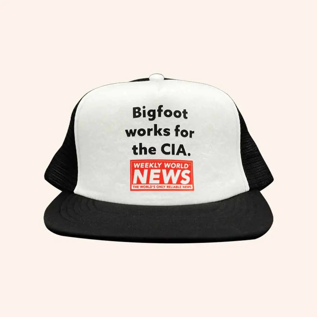 Weekly World News Merch Bigfoot Works For The CIA Snapback Trucker Hat Gifts For Him -WearandDecor