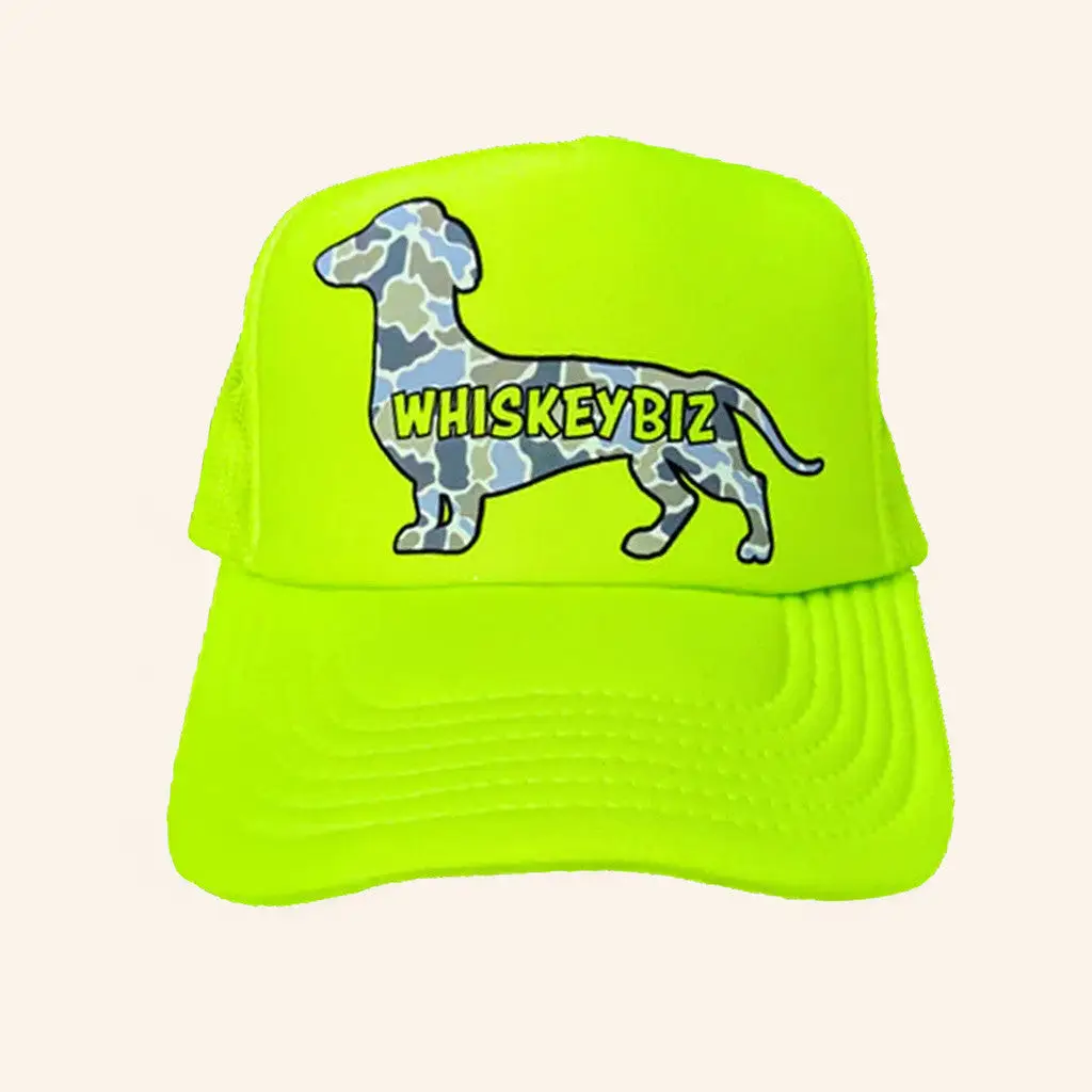 Whiskey Biz Merch Weenie Dog Camo Trucker Hat Gifts For Friends -WearandDecor Whiskey Biz Merch Weenie Dog Camo Trucker Hat Gifts For Friends -WearandDecor - Image 1